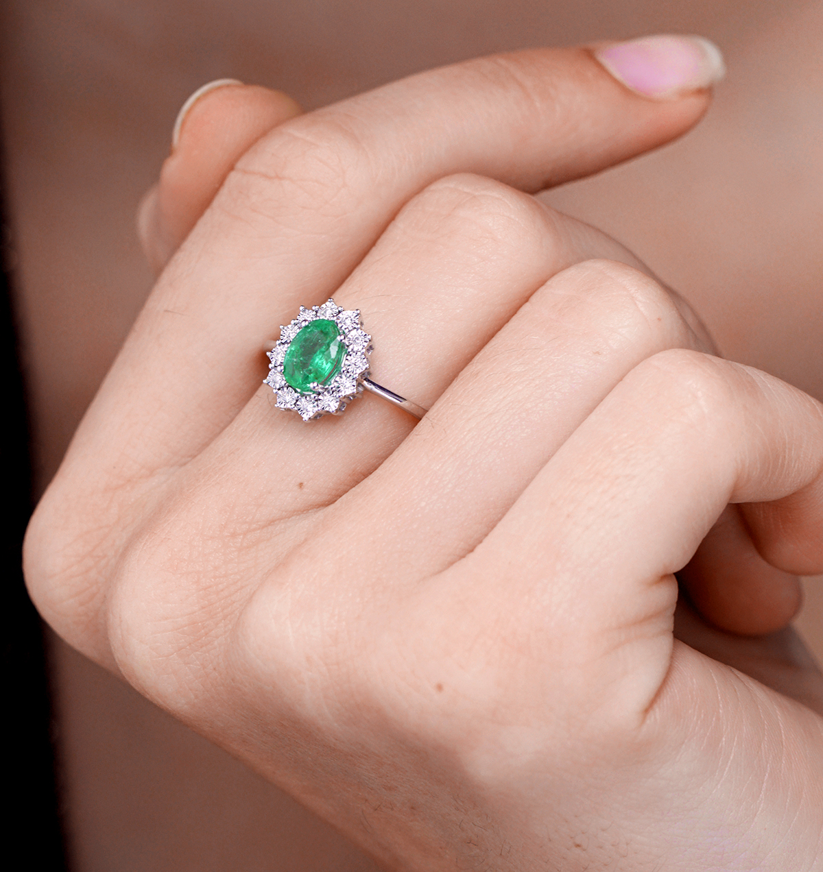 emerald ring with diamond halo