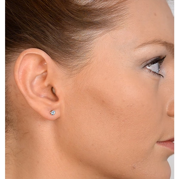 Blue Topaz 4mm 9K White Gold Stud Earrings - Image 2