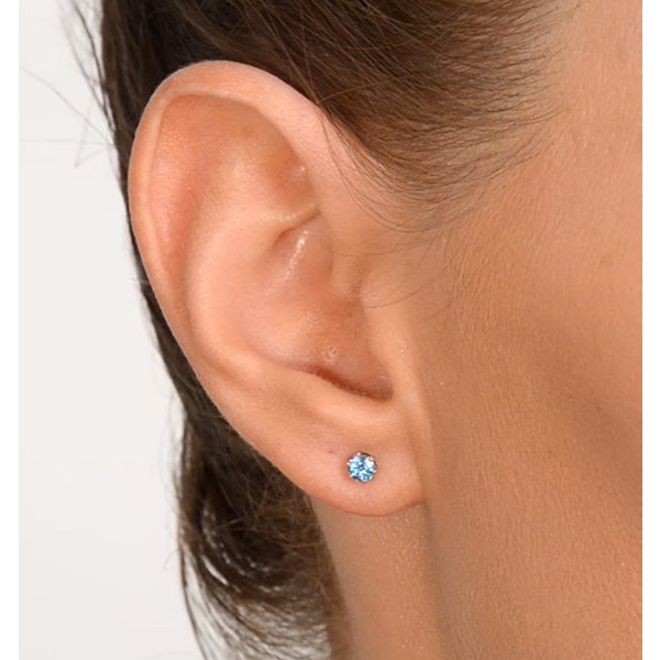 Blue Topaz 4mm 9K White Gold Stud Earrings - Image 3