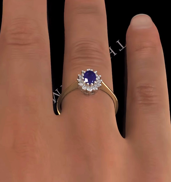 Tanzanite 6 x 4mm And Diamond 18K Gold Ring FET33V Size Q