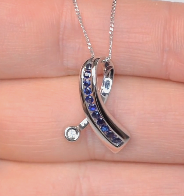 Diamond ribbon pendant on sale